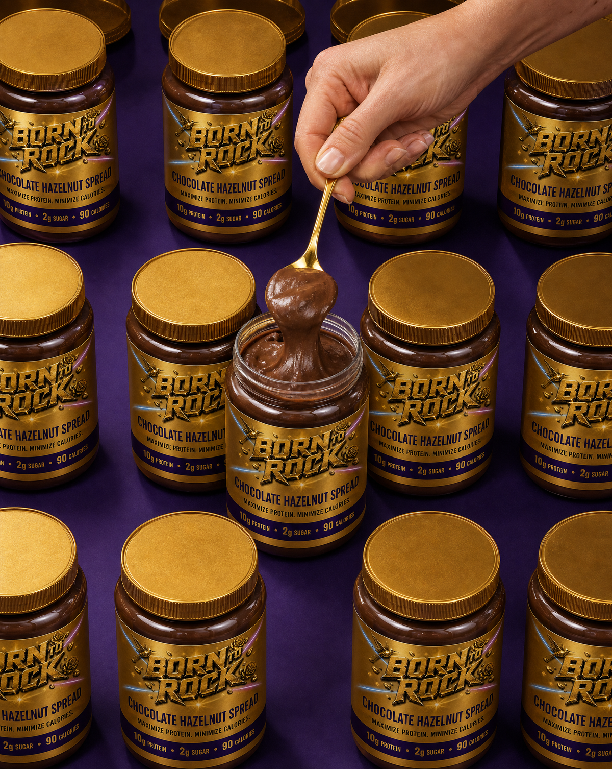 Overhead grid of many identical jars on deep purple, all capped except one open in the centre with a gold spoon lifting a scoop