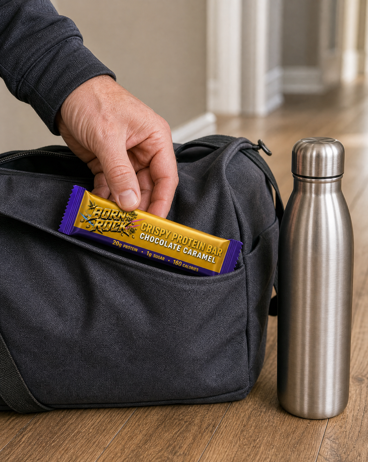 Wrapped Born To Rock crispy chocolate caramel bar tucked into a gym bag side pocket