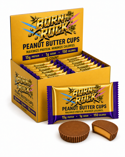 Twelve-count retail box of Born To Rock Peanut Butter Cups at a three-quarter angle, with one wrapped two-cup pack standing in front and two unwrapped cups at its base